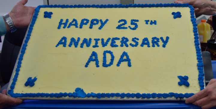 Happy 25th Anniversary ADA written on a cake